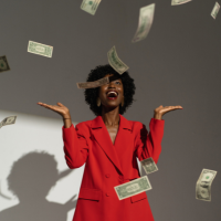 Woman_with_money_falling_stock_image_from_Canva_200x200