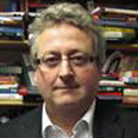 Portrait photo of Professor James Hughes
