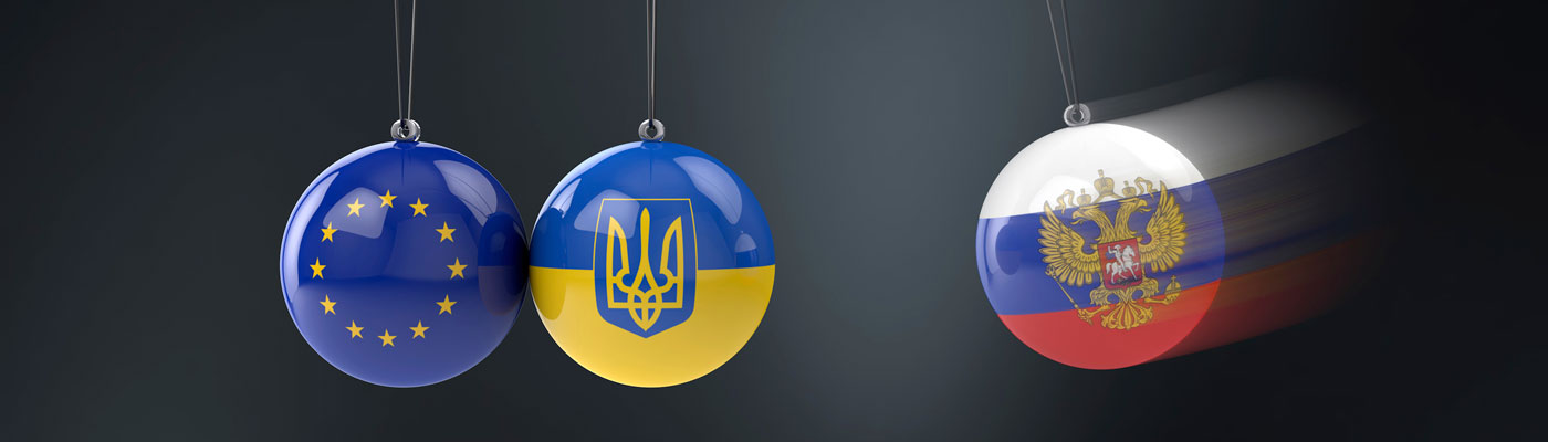 Avoiding a New Cold War? European Union, Ukrainian, and Russian flags