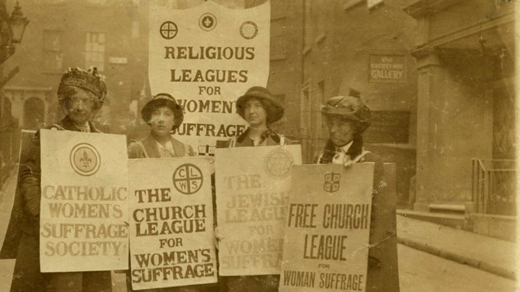 A group of women with placards