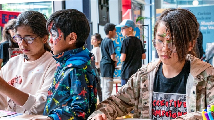 Children working together on arts and crafts activities