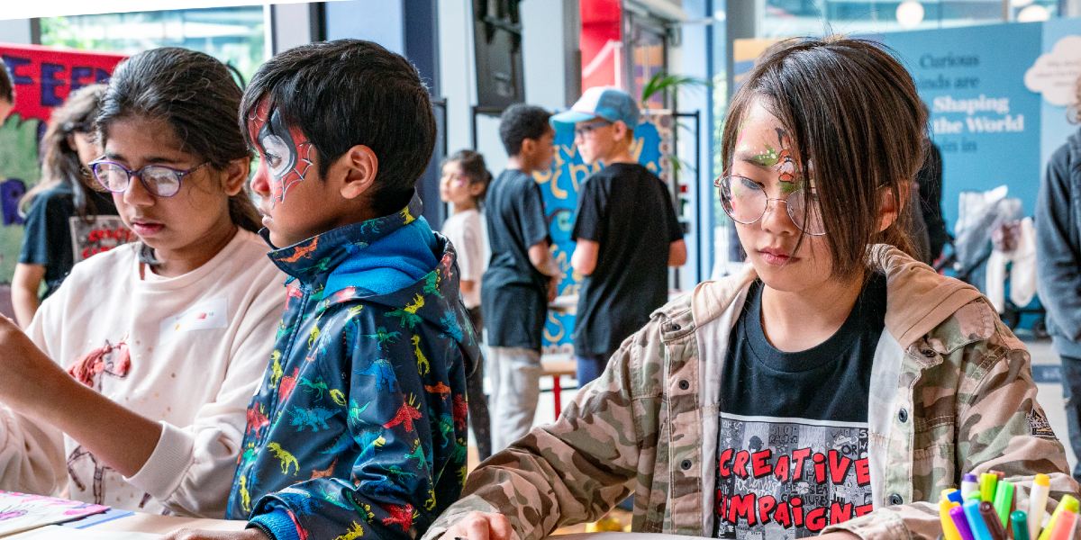 Children working together on arts and crafts activities