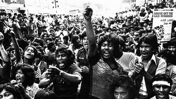 A crowd of people protesting