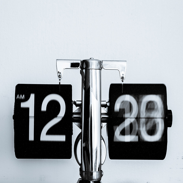 Image of time passing on a clock