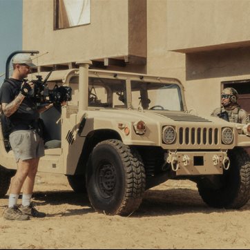 cameraman army truck