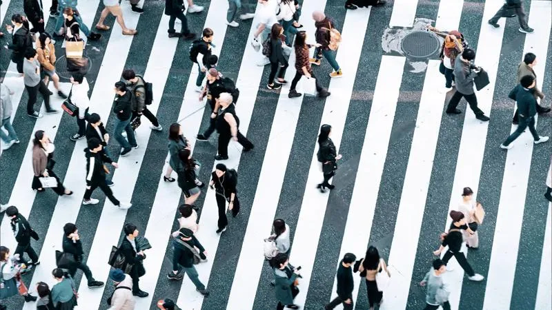 People walking in a city Economic and Political Development in Developing Countries